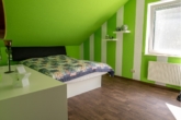 Schlafzimmer 2 - Familienfreundliches Traumhaus in Rhauderfehn – viel Platz, Garten, Terrasse & Garage
