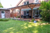 Überdachte Terrasse - Familienfreundliches Traumhaus in Rhauderfehn – viel Platz, Garten, Terrasse & Garage