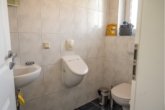 Gäste-WC - Familienfreundliches Traumhaus in Rhauderfehn – viel Platz, Garten, Terrasse & Garage