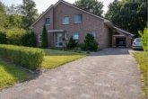 Ansicht vorne - Familienfreundliches Traumhaus in Rhauderfehn – viel Platz, Garten, Terrasse & Garage