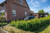 Seiten Ansicht - Charmantes Einfamilienhaus mit Geschichte, großem Garten und vielen Extras