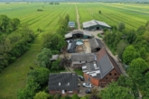 Luftbild - Milchviehbetrieb mit arrondierten Grünlandflächen und entwicklungsperspektive zu Verkaufen!