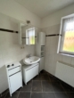 Badezimmer - Schön geschnittene Wohnung mit Garten und überdachter Terrasse